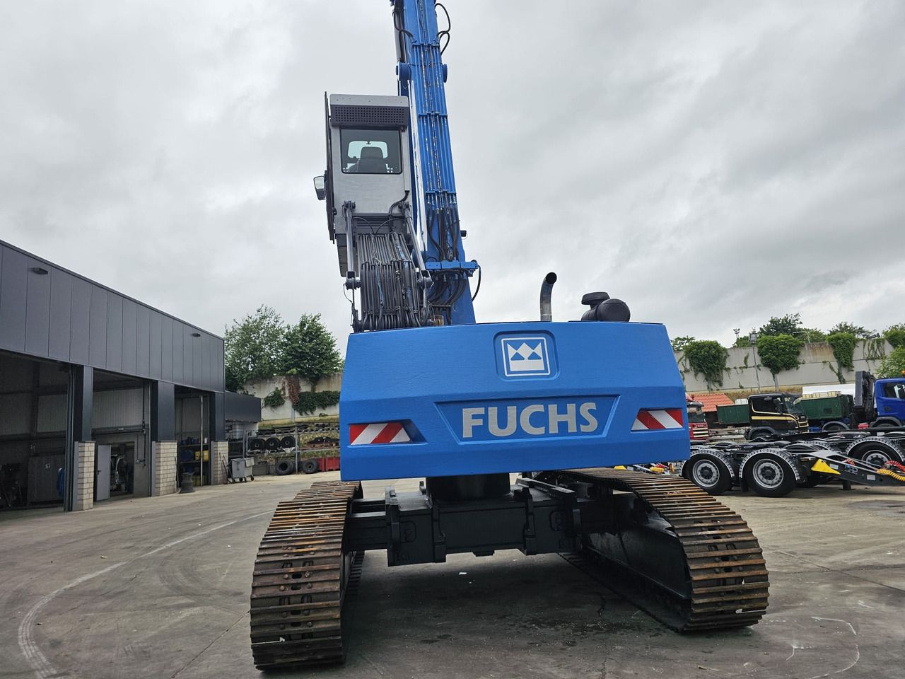 Pelle de manutention Fuchs RHL 350 Materialhandler With Adjustable Tracks: photos 7