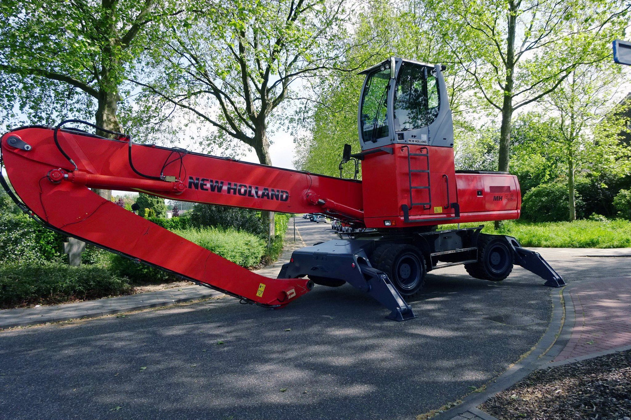 New Holland MH 6.6 With Multi Purpose Stick And Magnet System - Pelle de manutention: photos 4 New Holland MH 6.6 With Multi Purpose Stick And Magnet System - Pelle de manutention: photos 4