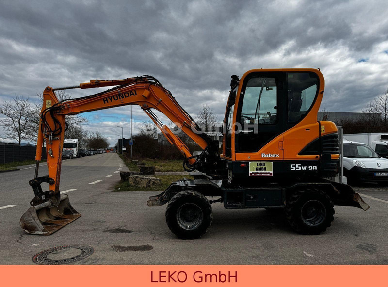 Hyundai Robex 55W-9A Mit Drei Löffeln - Pelle sur pneus: photos 4 Hyundai Robex 55W-9A Mit Drei Löffeln - Pelle sur pneus: photos 4