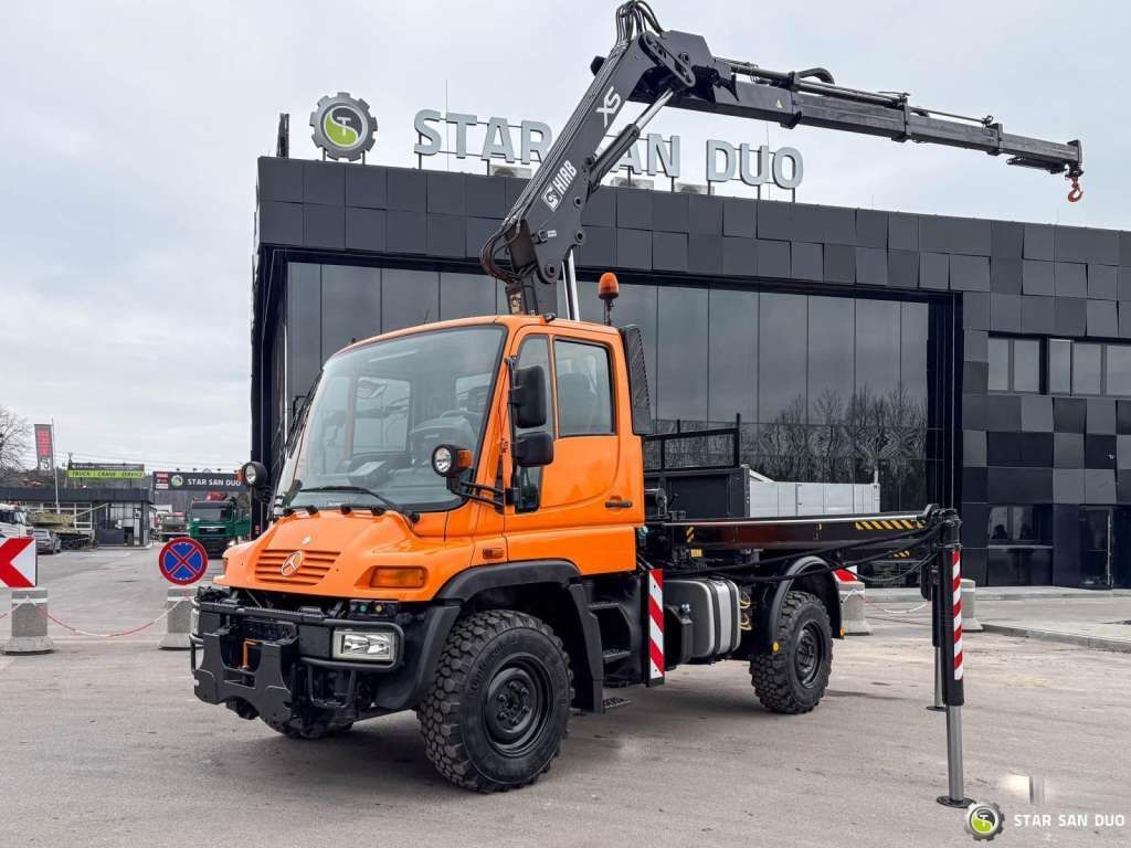 Unimog Mercedes-Benz UNIMOG U300 4x4 HIAB 122 D-3 CRANE Unimog Mercedes-Benz UNIMOG U300 4x4 HIAB 122 D-3 CRANE - Camion grue, Camion plateau: photos 1 Unimog Mercedes-Benz UNIMOG U300 4x4 HIAB 122 D-3 CRANE Unimog Mercedes-Benz UNIMOG U300 4x4 HIAB 122 D-3 CRANE - Camion grue, Camion plateau: photos 1
