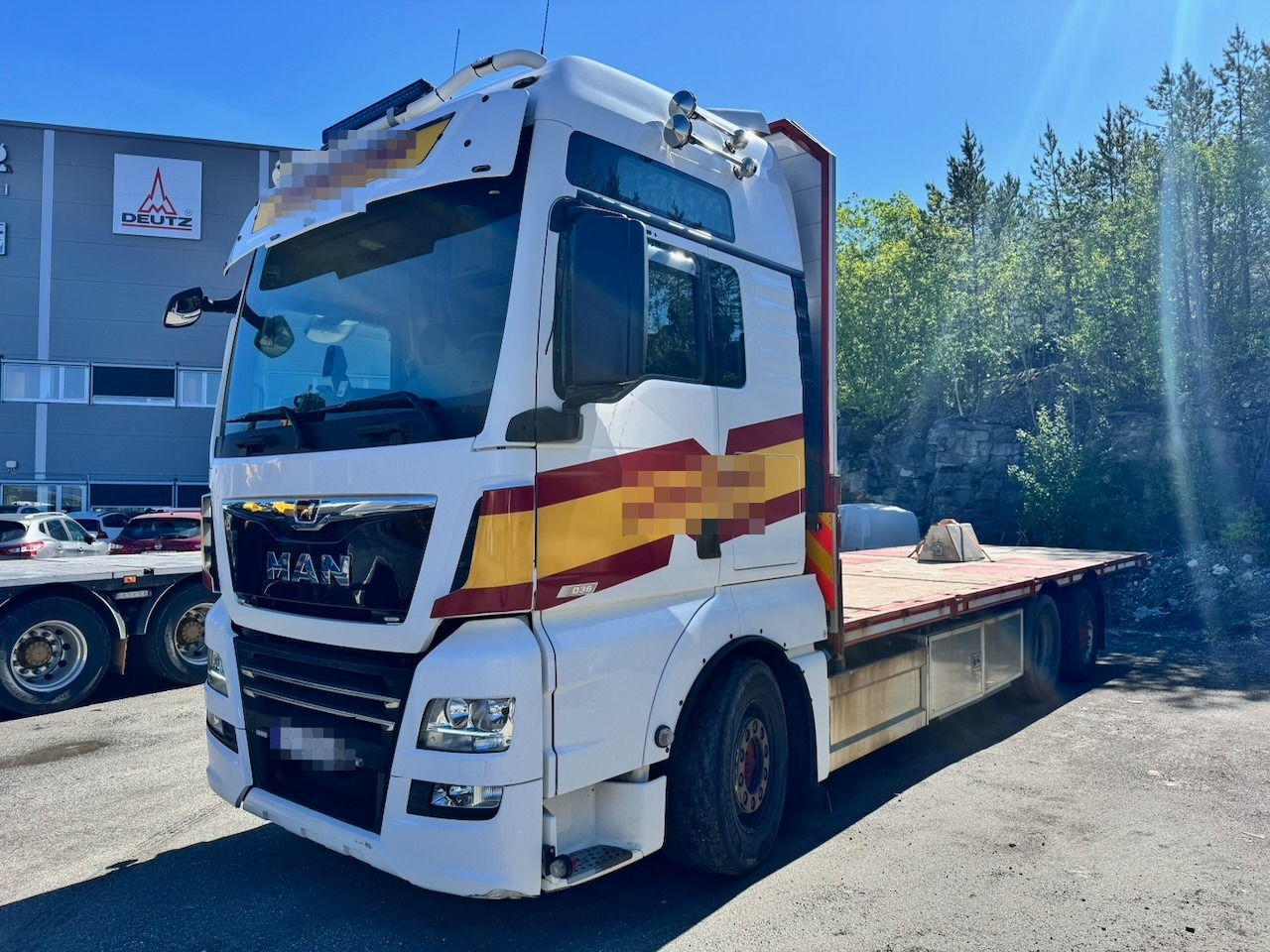 MAN TGX 580 - Camion plateau: photos 1 MAN TGX 580 - Camion plateau: photos 1