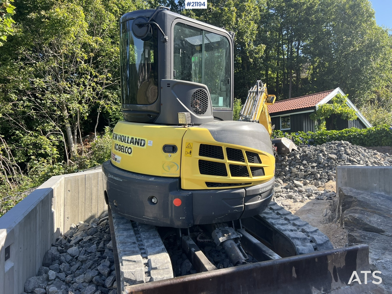 Pelle sur chenille New Holland E55B: photos 14