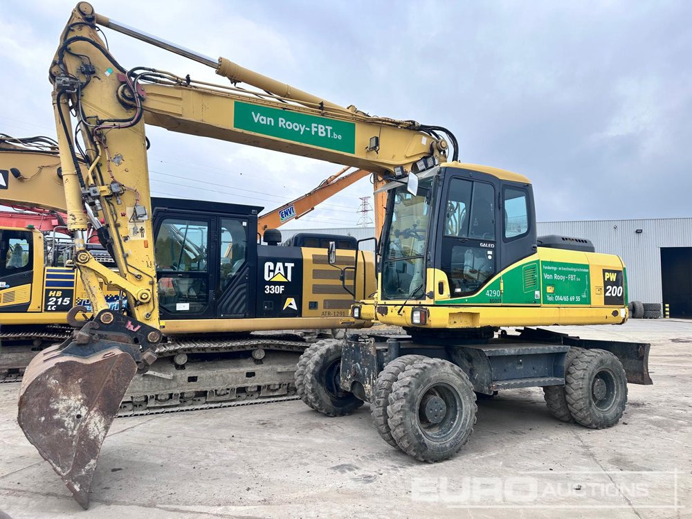 2009 Komatsu PW200-7H - Pelle sur pneus: photos 1 2009 Komatsu PW200-7H - Pelle sur pneus: photos 1