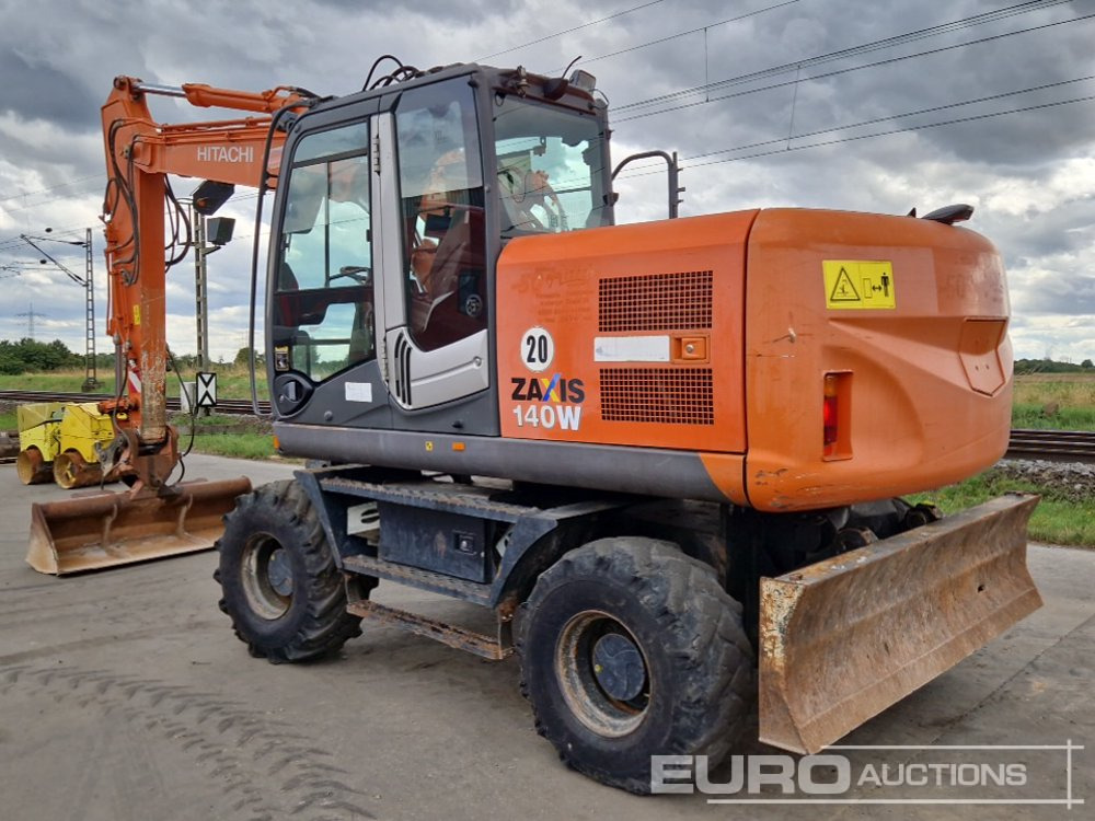 Hitachi ZX140W-3 - Pelle sur pneus: photos 3 Hitachi ZX140W-3 - Pelle sur pneus: photos 3