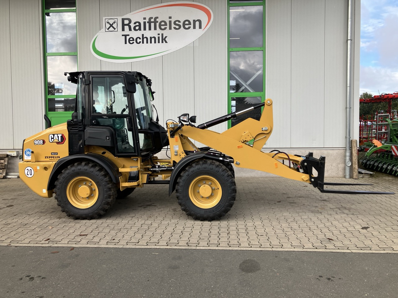 Caterpillar 908 HL - Chargeuse sur pneus: photos 1 Caterpillar 908 HL - Chargeuse sur pneus: photos 1
