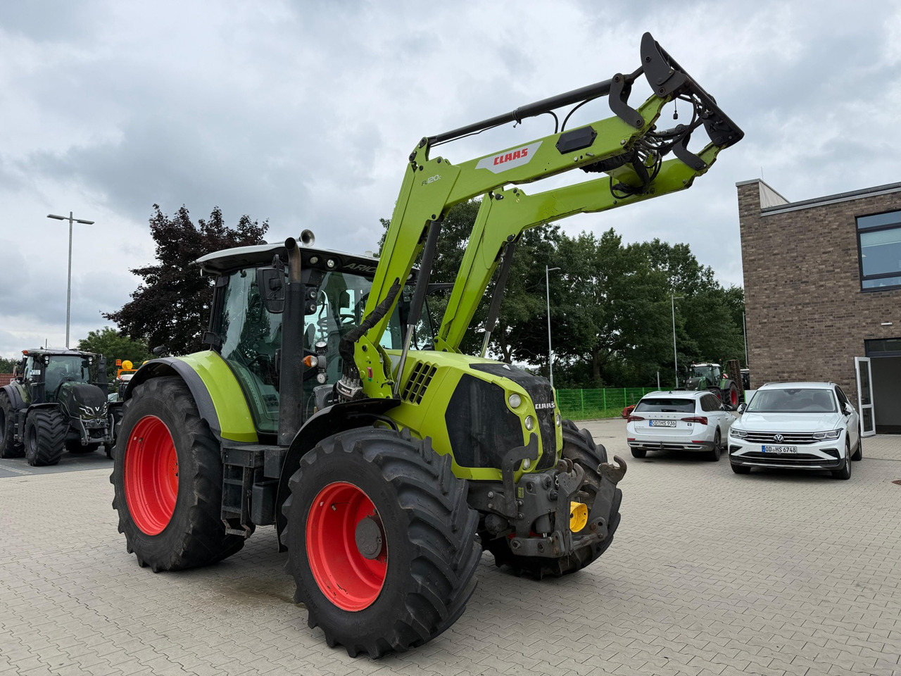 Claas Arion 650 C-Matic - Tracteur agricole: photos 1 Claas Arion 650 C-Matic - Tracteur agricole: photos 1
