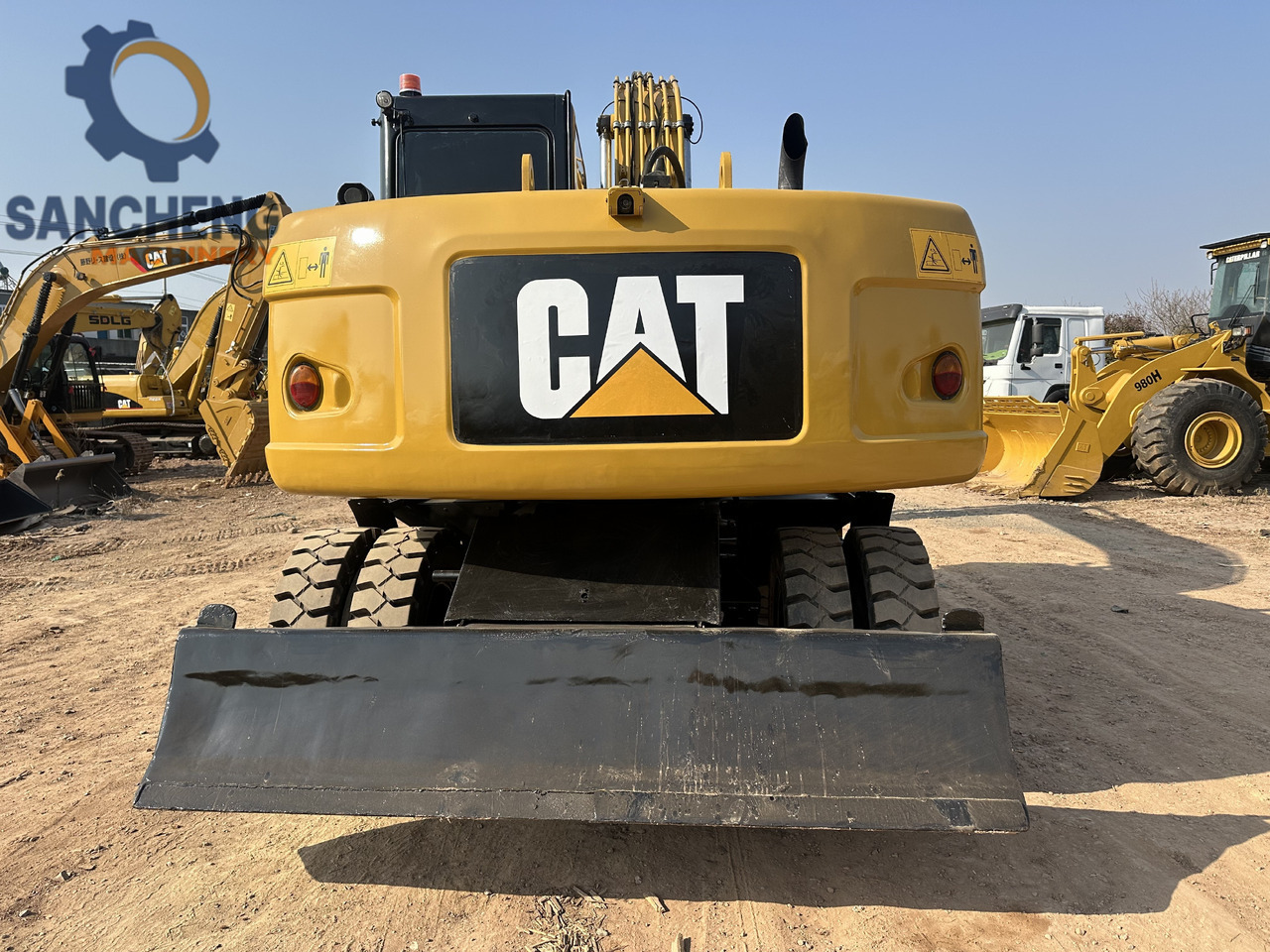CATERPILLAR M320D2 - Pelle sur pneus: photos 5 CATERPILLAR M320D2 - Pelle sur pneus: photos 5