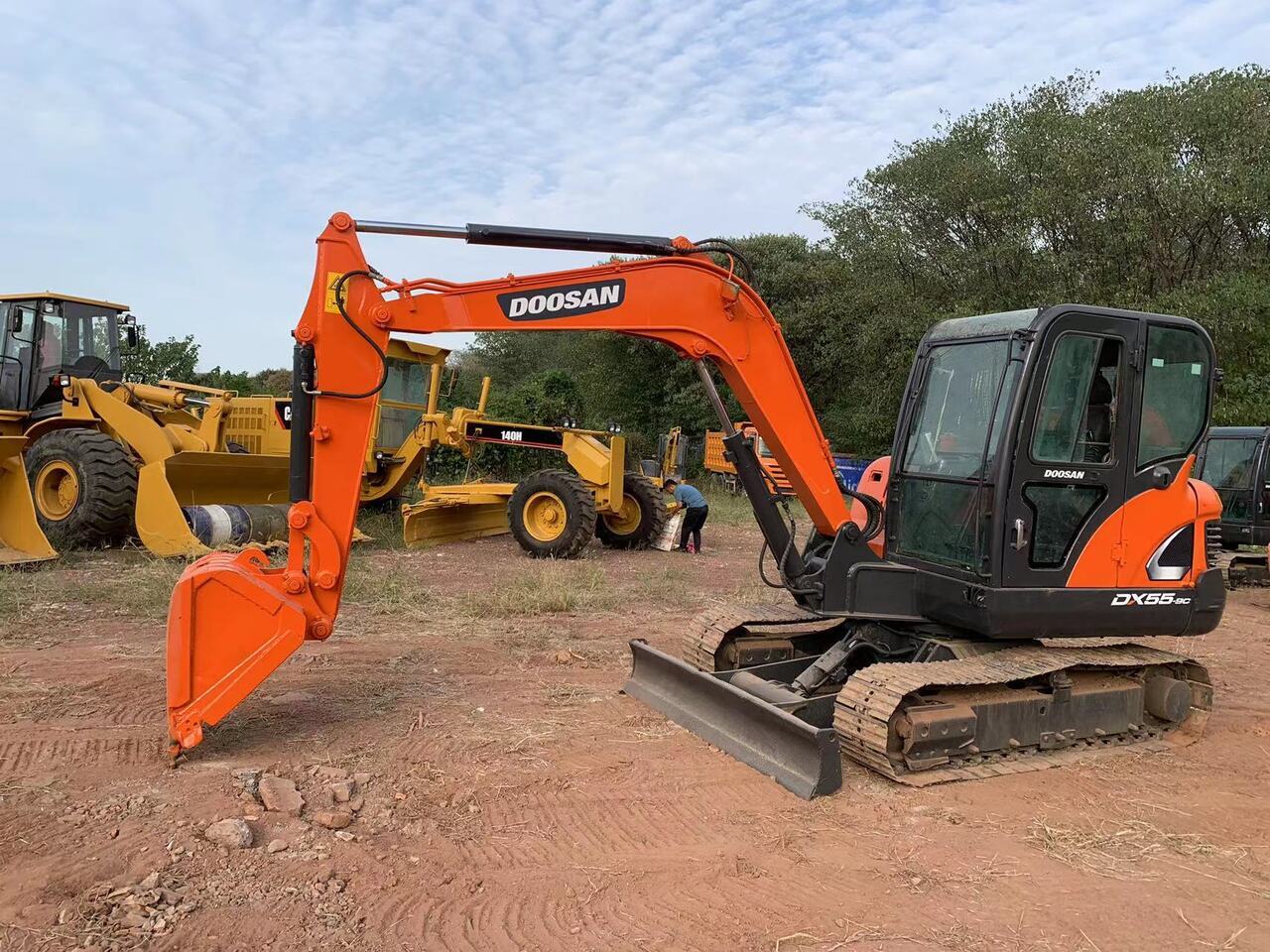 DOOSAN DX55 - Pelle: photos 1 DOOSAN DX55 - Pelle: photos 1