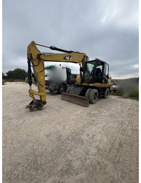Caterpillar M313D - Pelle: photos 1 Caterpillar M313D - Pelle: photos 1
