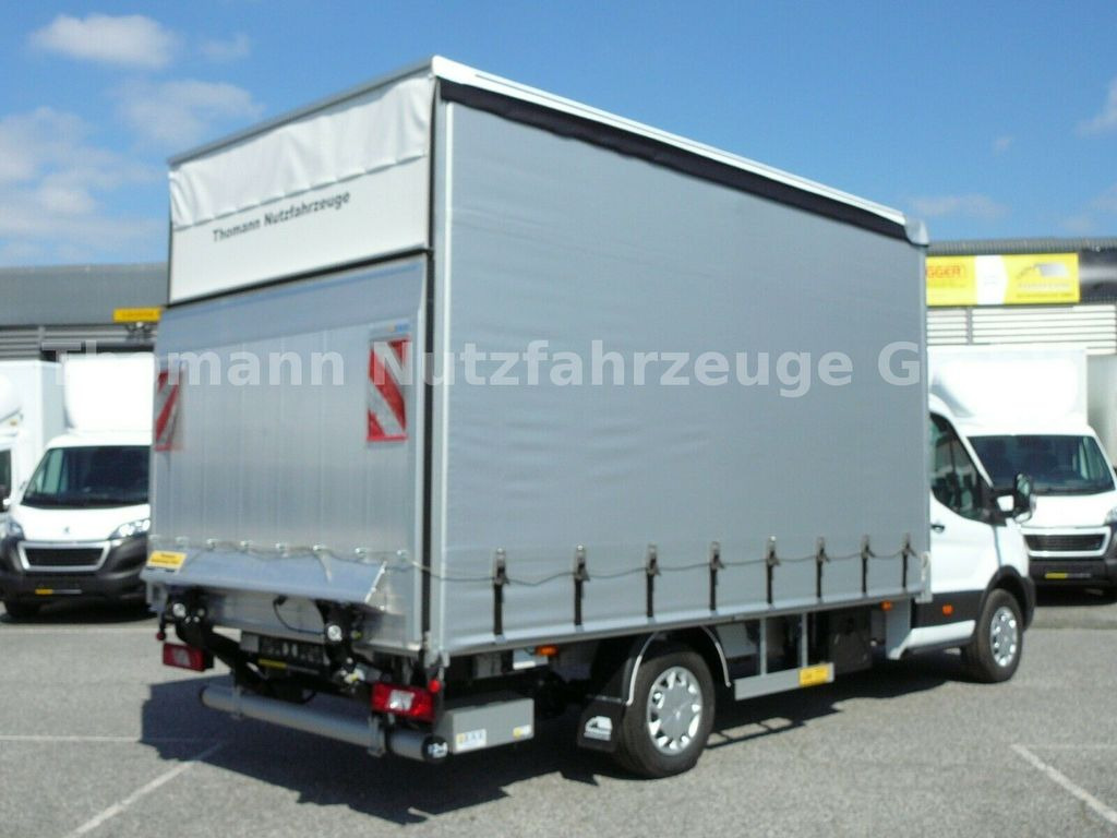 Ford Transit Pritsche Plane Ladebordwand Klima Temp. - Utilitaire rideaux coulissants (PLSC): photos 5 Ford Transit Pritsche Plane Ladebordwand Klima Temp. - Utilitaire rideaux coulissants (PLSC): photos 5