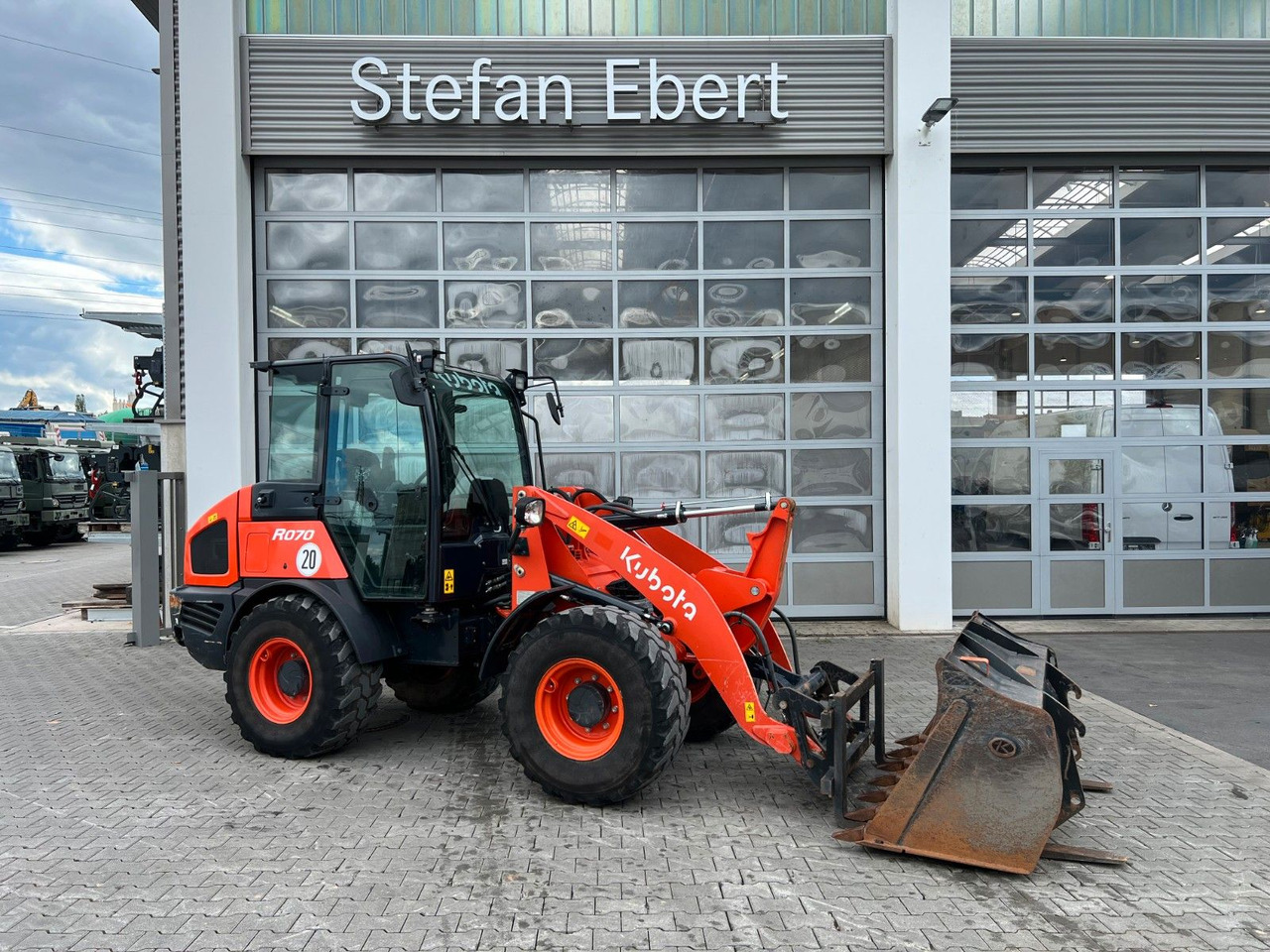 Kubota R070 / Gabel & Schaufel / nur 1.869h! - Chargeuse sur pneus: photos 1 Kubota R070 / Gabel & Schaufel / nur 1.869h! - Chargeuse sur pneus: photos 1