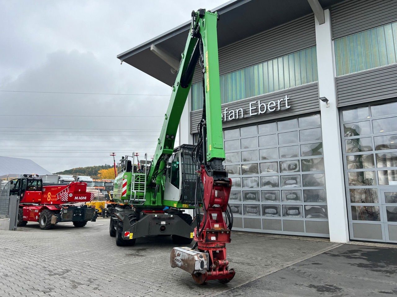 Sennebogen 718 / inkl. Vosch Fällzange / nur 1.965h! - Pelle sur pneus: photos 3 Sennebogen 718 / inkl. Vosch Fällzange / nur 1.965h! - Pelle sur pneus: photos 3