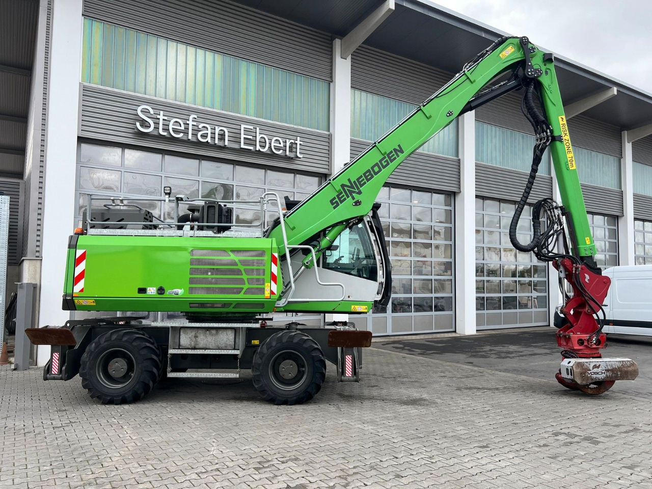 Sennebogen 718 / inkl. Vosch Fällzange / nur 1.965h! - Pelle sur pneus: photos 1 Sennebogen 718 / inkl. Vosch Fällzange / nur 1.965h! - Pelle sur pneus: photos 1