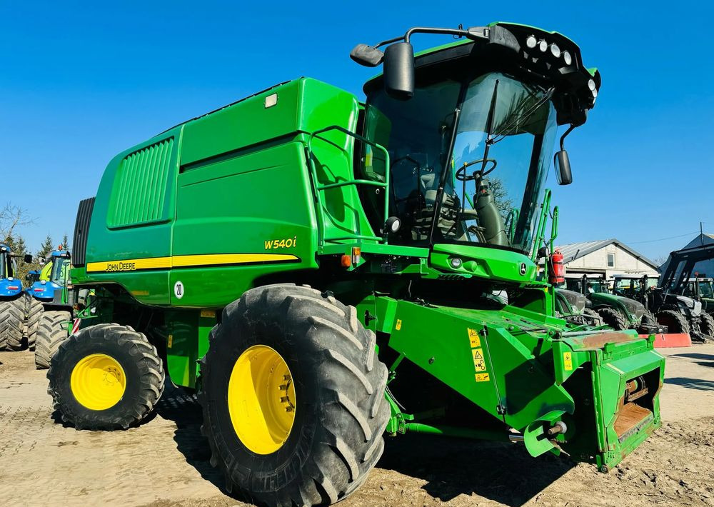 John Deere W540i - Moissonneuse-batteuse: photos 1 John Deere W540i - Moissonneuse-batteuse: photos 1