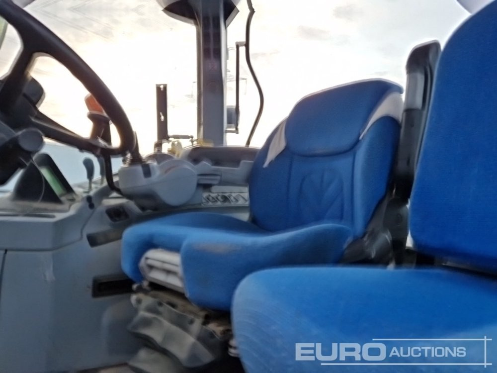 Tracteur agricole New Holland T6080: photos 31 Tracteur agricole New Holland T6080: photos 31