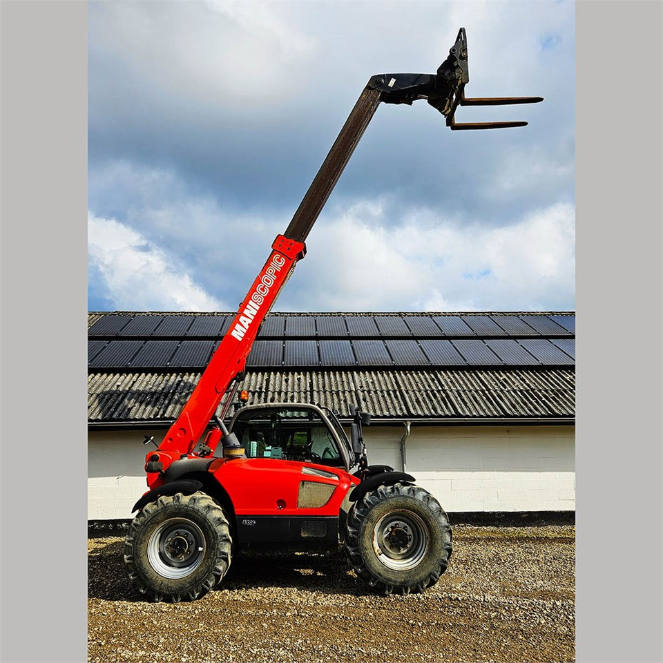 Manitou MT 732 - Chariot télescopique: photos 1 Manitou MT 732 - Chariot télescopique: photos 1
