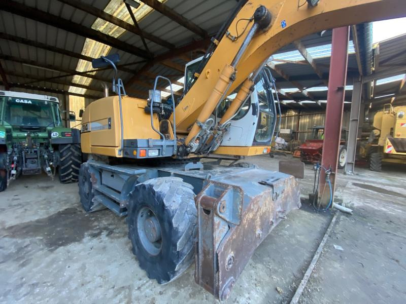 Liebherr A314 Litronic - Pelle sur pneus: photos 3 Liebherr A314 Litronic - Pelle sur pneus: photos 3