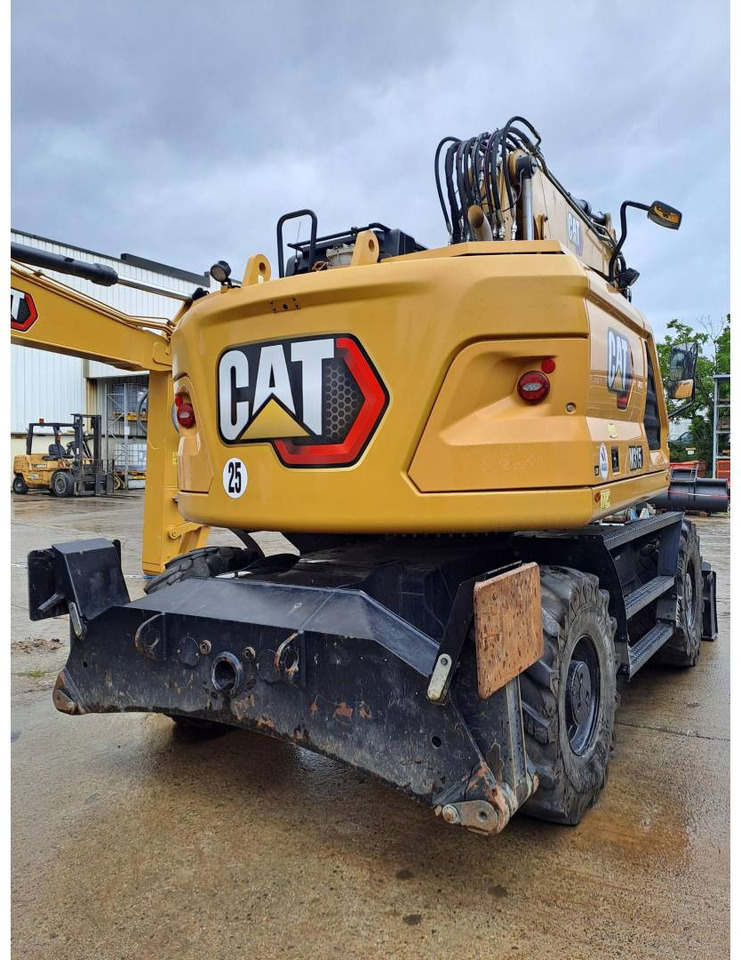 Pelle sur pneus CAT M315: photos 11