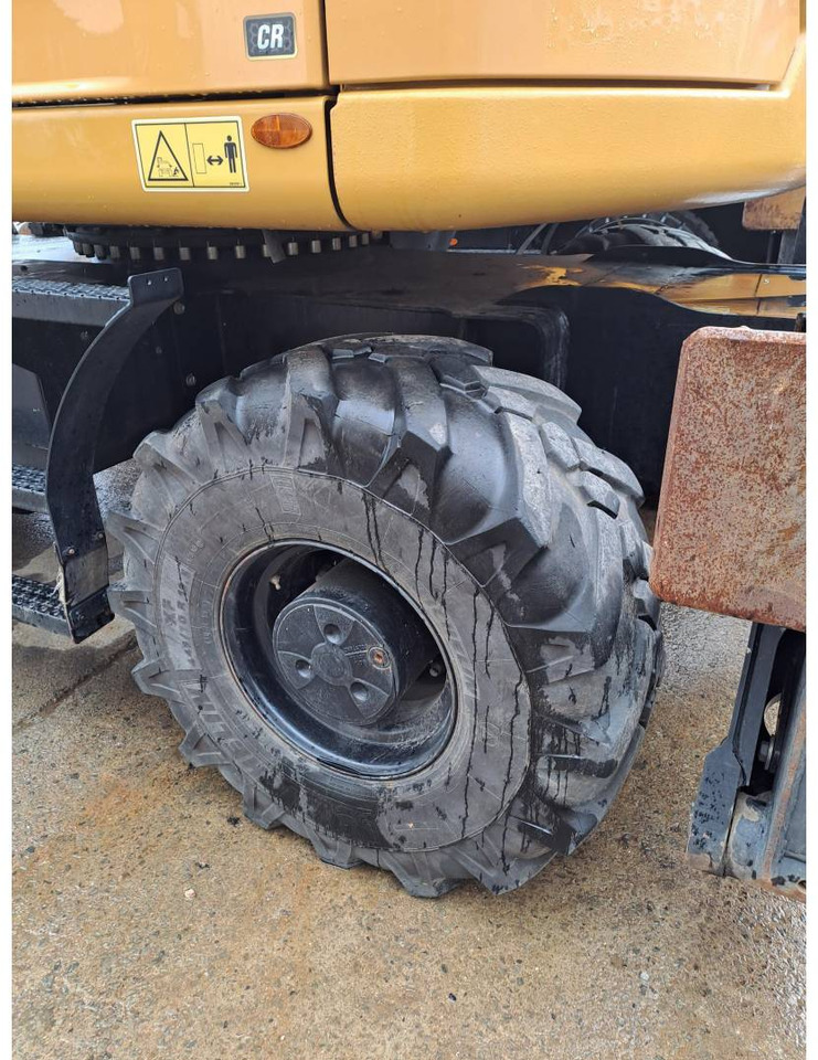 Pelle sur pneus CAT M315: photos 18