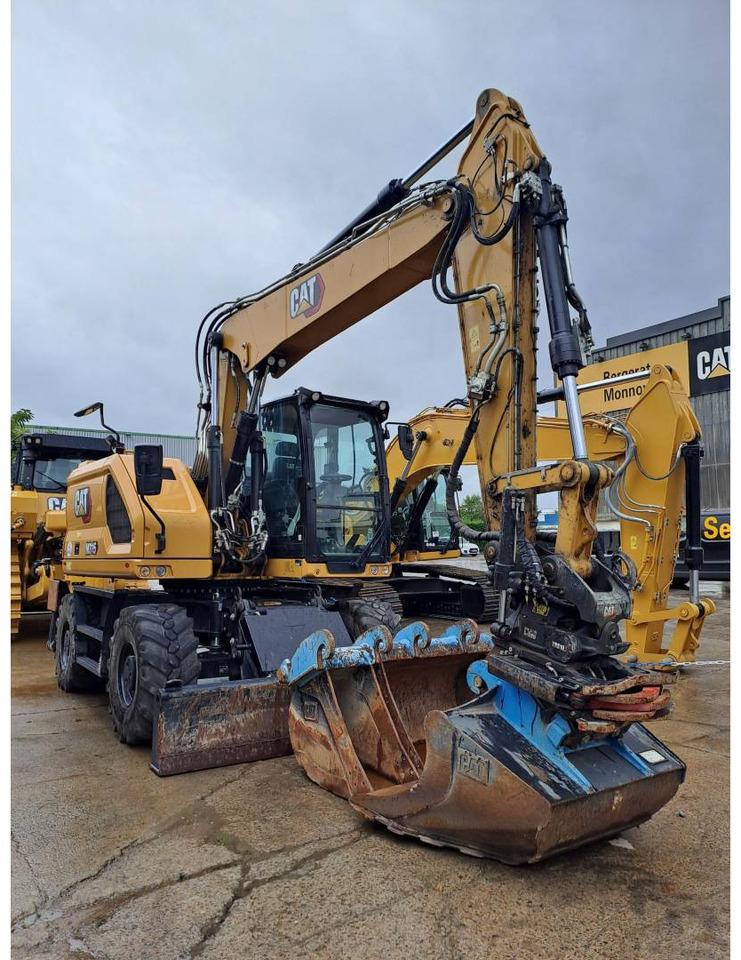 Pelle sur pneus CAT M315: photos 16