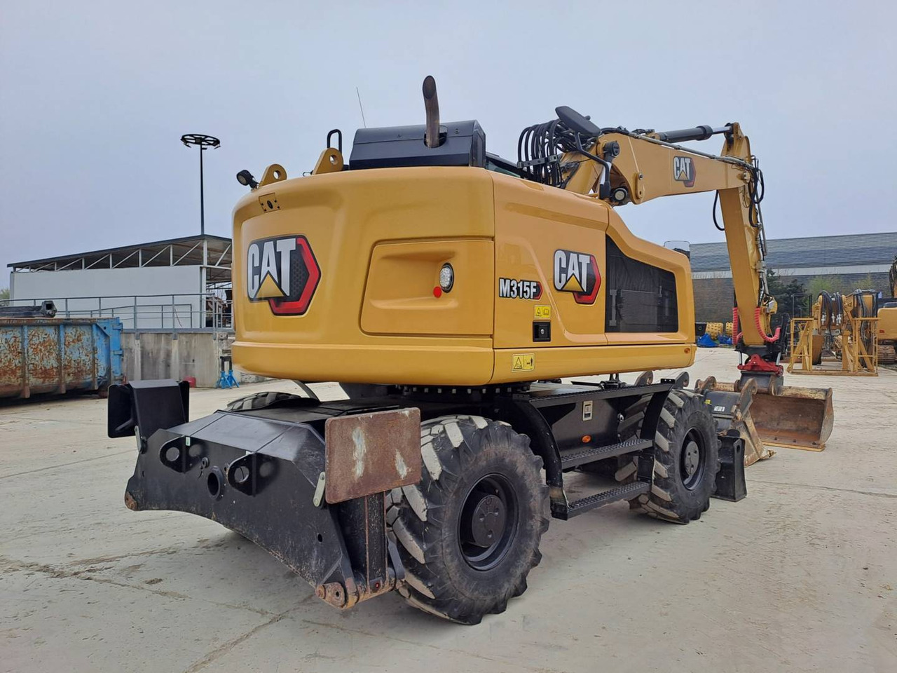 Pelle sur pneus CAT M315F IVC: photos 6 Pelle sur pneus CAT M315F IVC: photos 6