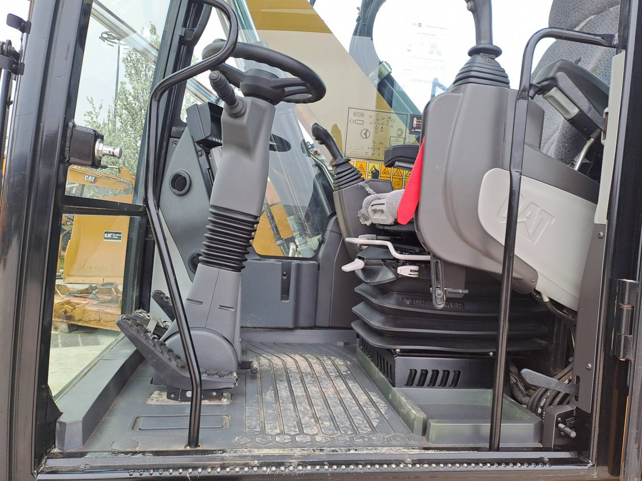 Pelle sur pneus CAT M315F IVC: photos 27 Pelle sur pneus CAT M315F IVC: photos 27