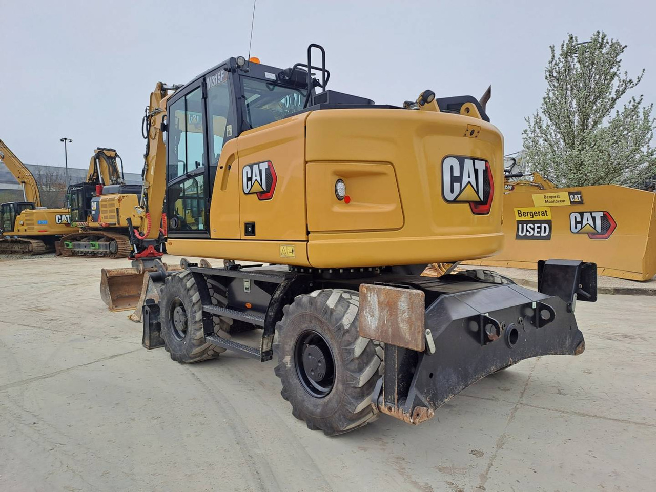 Pelle sur pneus CAT M315F IVC: photos 8 Pelle sur pneus CAT M315F IVC: photos 8