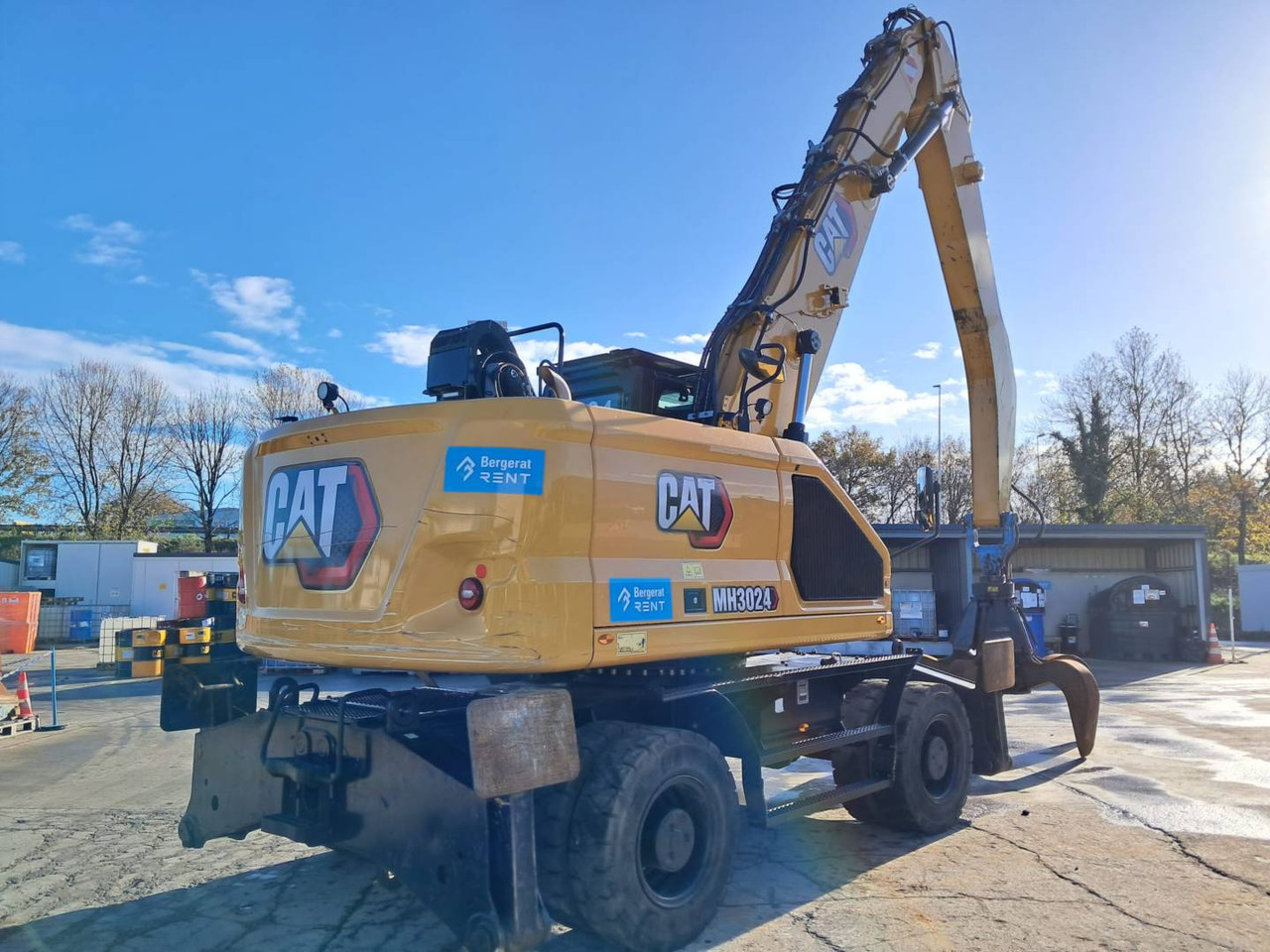CAT MH3024 - Pelle sur pneus: photos 4 CAT MH3024 - Pelle sur pneus: photos 4