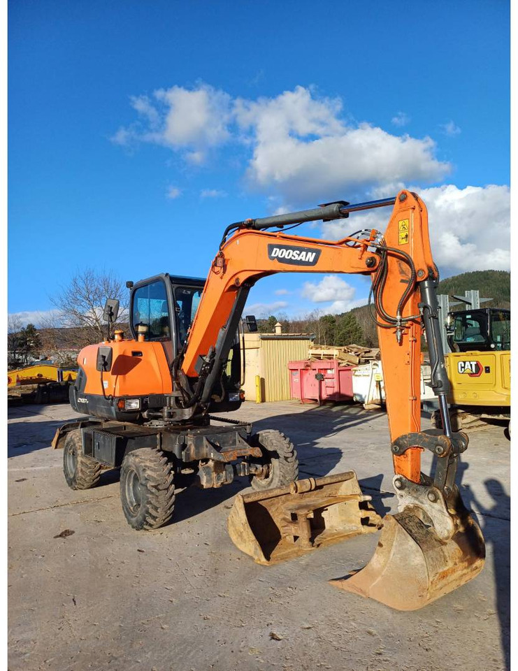 DOOSAN INFRACORE AMERICA CORP. DX57W-7 - Pelle sur pneus: photos 2 DOOSAN INFRACORE AMERICA CORP. DX57W-7 - Pelle sur pneus: photos 2