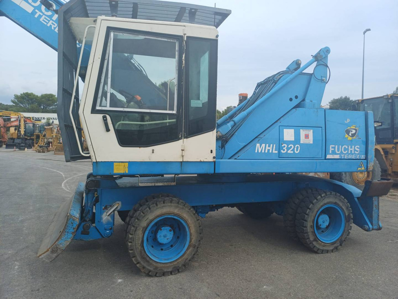 FUCHS MHL320 - Pelle sur pneus: photos 1 FUCHS MHL320 - Pelle sur pneus: photos 1