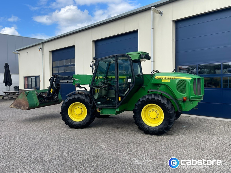 John Deere 3415 Verreiker met vorken en laadschop - Machine agricole: photos 3 John Deere 3415 Verreiker met vorken en laadschop - Machine agricole: photos 3