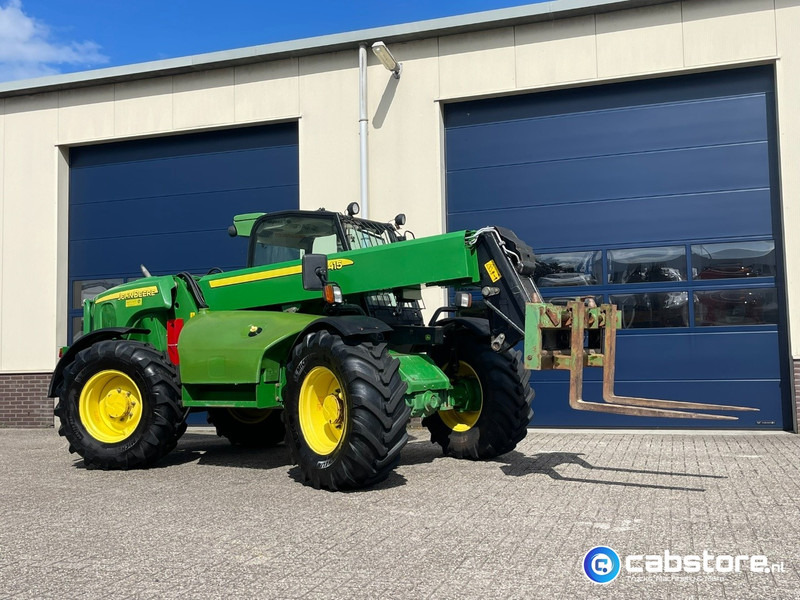 John Deere 3415 Verreiker met vorken en laadschop - Machine agricole: photos 2 John Deere 3415 Verreiker met vorken en laadschop - Machine agricole: photos 2