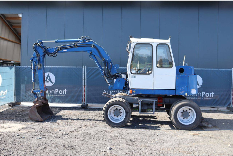 Atlas 1004 - Pelle sur pneus: photos 2 Atlas 1004 - Pelle sur pneus: photos 2