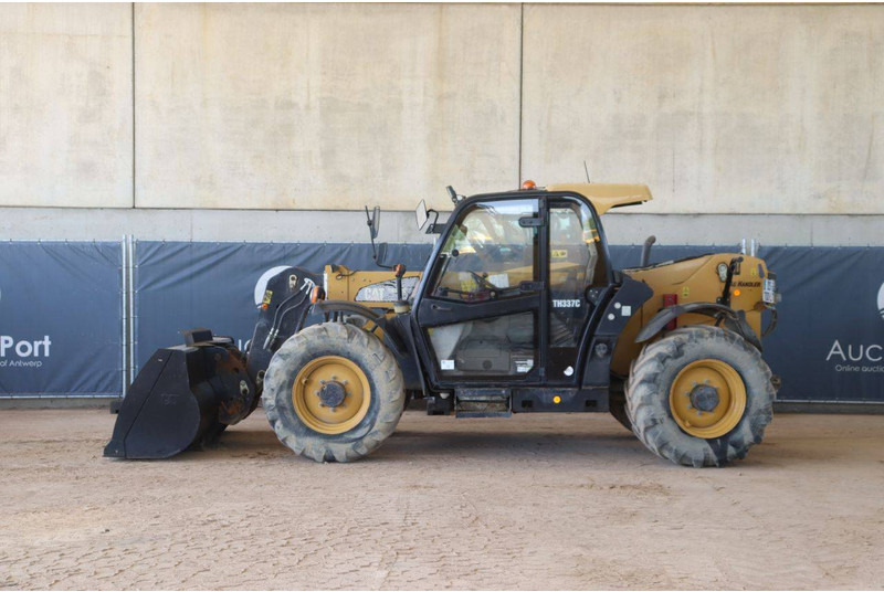 Caterpillar TH337C - Chariot télescopique: photos 2 Caterpillar TH337C - Chariot télescopique: photos 2