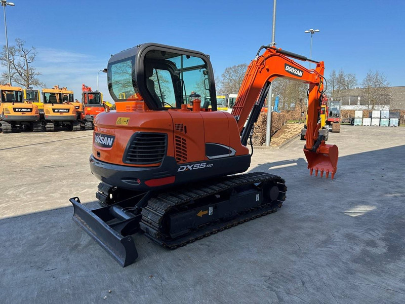 Doosan DX55-9C - Pelle sur chenille: photos 4 Doosan DX55-9C - Pelle sur chenille: photos 4