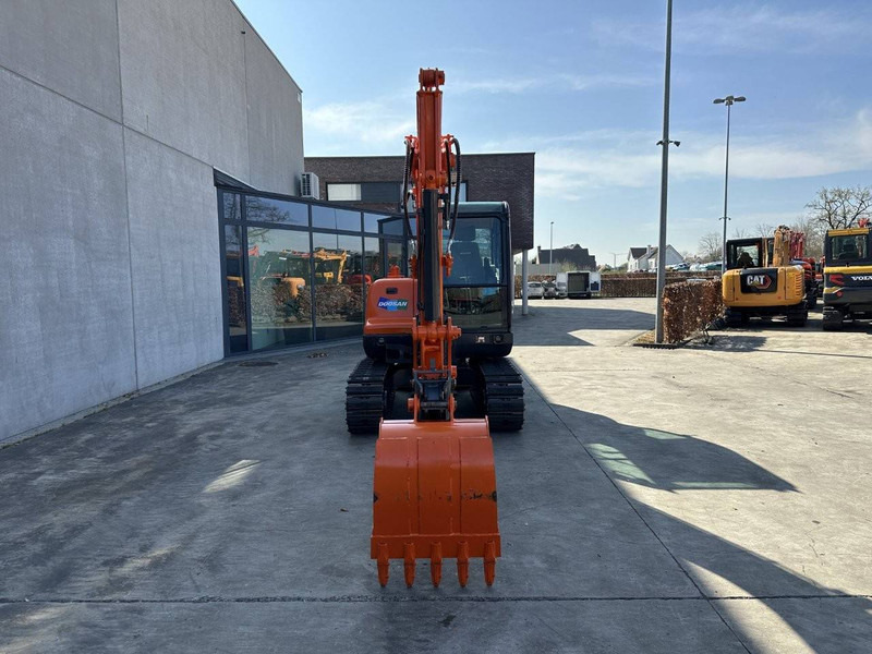 Doosan DX55-9C - Pelle sur chenille: photos 2 Doosan DX55-9C - Pelle sur chenille: photos 2