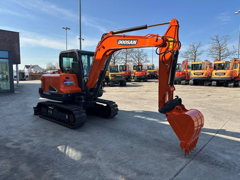 Doosan DX55-9C - Pelle sur chenille: photos 3 Doosan DX55-9C - Pelle sur chenille: photos 3