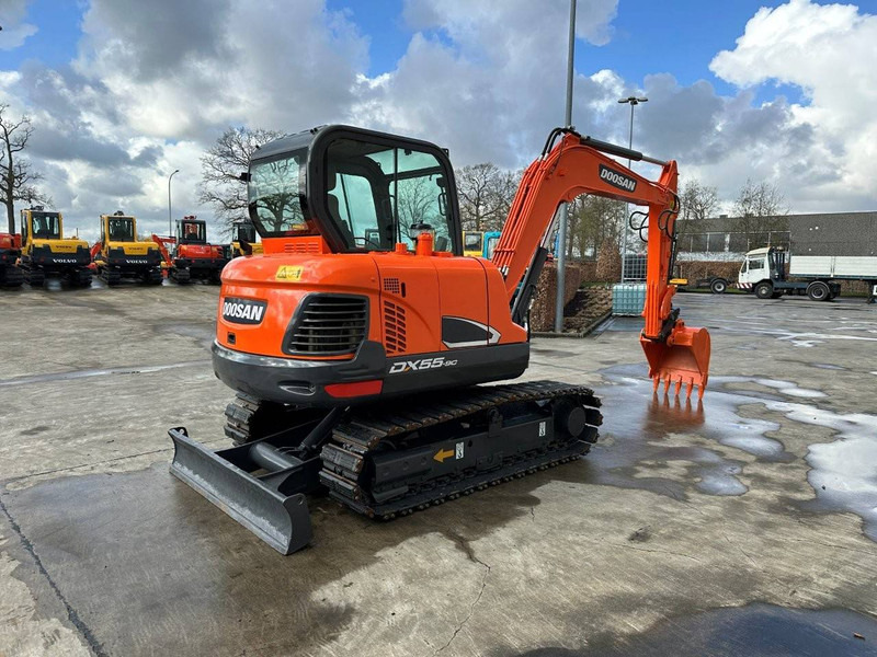 Doosan DX55-9C - Pelle sur chenille: photos 4 Doosan DX55-9C - Pelle sur chenille: photos 4