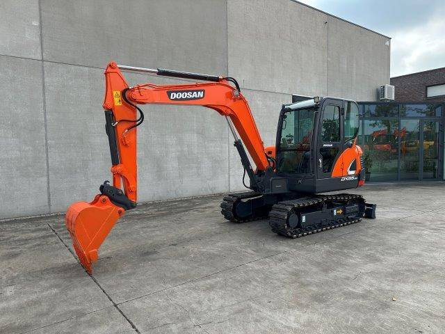 Doosan DX55-9C - Pelle sur chenille: photos 1 Doosan DX55-9C - Pelle sur chenille: photos 1
