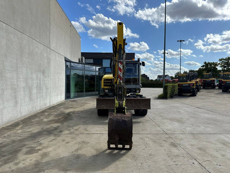 Neuson EW100 - Pelle sur pneus: photos 2 Neuson EW100 - Pelle sur pneus: photos 2