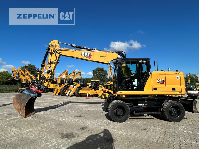 Cat M318-07A - Pelle sur pneus: photos 1 Cat M318-07A - Pelle sur pneus: photos 1