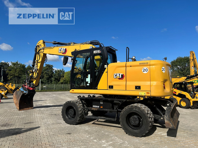 Cat M318-07A - Pelle sur pneus: photos 2 Cat M318-07A - Pelle sur pneus: photos 2