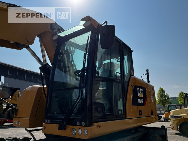 Pelle sur pneus Cat M318F: photos 27 Pelle sur pneus Cat M318F: photos 27