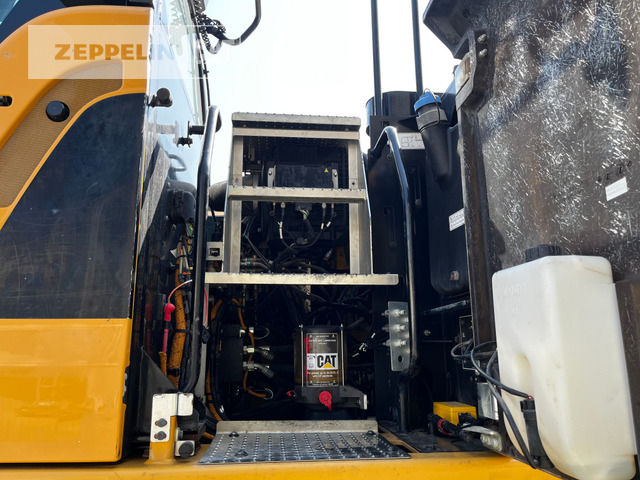 Pelle sur pneus Cat M318F: photos 21 Pelle sur pneus Cat M318F: photos 21