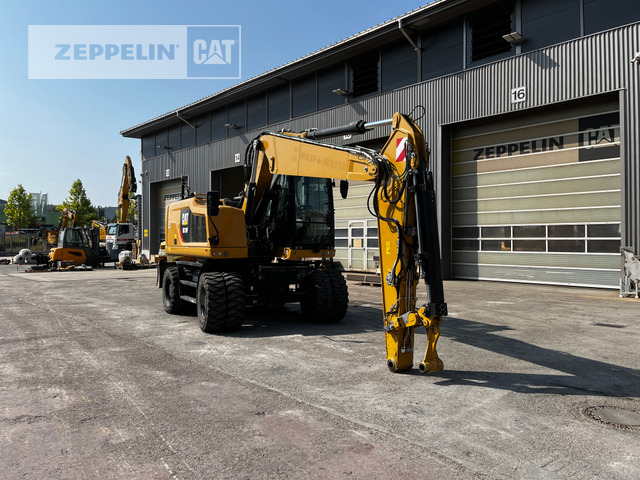 Pelle sur pneus Cat M318F: photos 6 Pelle sur pneus Cat M318F: photos 6