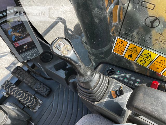 Pelle sur pneus Cat M318F: photos 34 Pelle sur pneus Cat M318F: photos 34