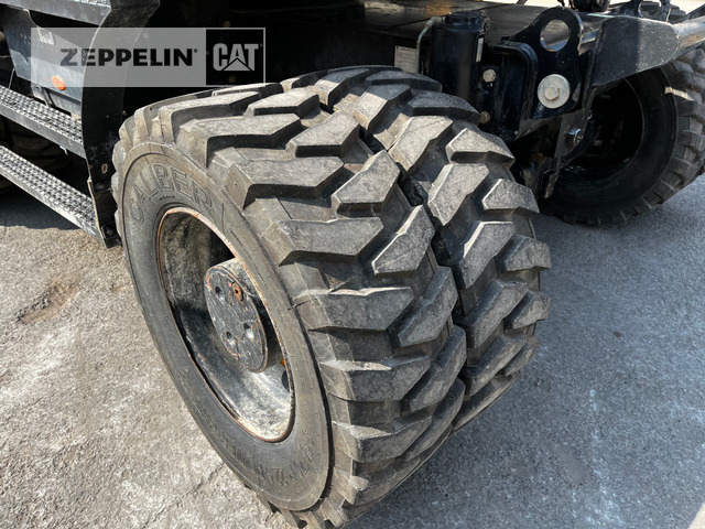 Pelle sur pneus Cat M318F: photos 15 Pelle sur pneus Cat M318F: photos 15