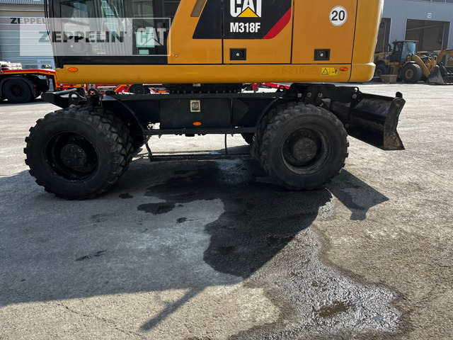 Pelle sur pneus Cat M318F: photos 10 Pelle sur pneus Cat M318F: photos 10