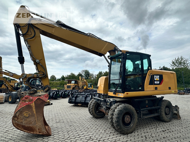 Cat M320F - Pelle sur pneus: photos 1 Cat M320F - Pelle sur pneus: photos 1