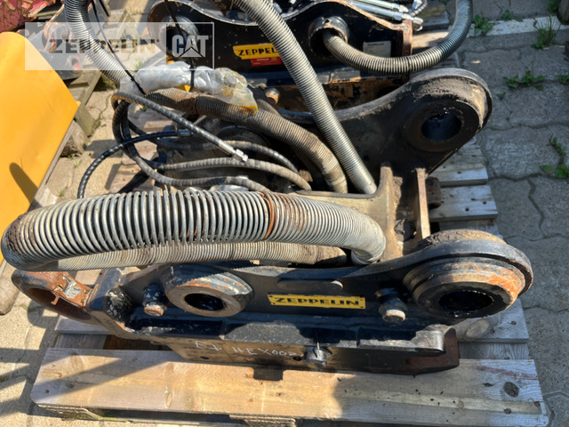 Oil-Quick OQ65  M312-M318F - Attache rapide pour Engins de chantier: photos 2 Oil-Quick OQ65  M312-M318F - Attache rapide pour Engins de chantier: photos 2